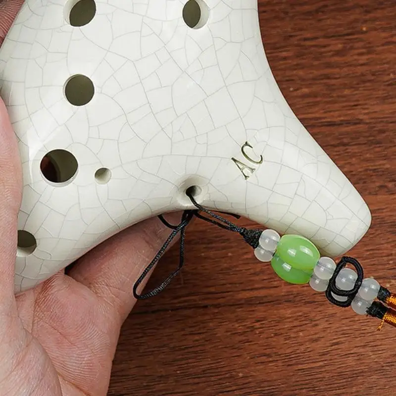 M5TC 12 Hole Ceramic Ocarina Musical Device Smooth Surfaces Balanced Tone Output for Aspiring Musicians and Collectors
M5TC 12 Hole Ceramic Ocarina Musical Device Smooth Surfaces Balanced Tone Output for Aspiring Musicians and Collectors