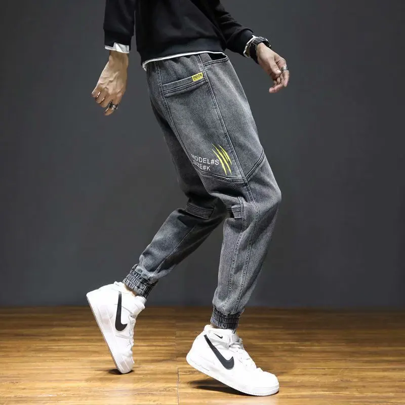Модные мужские эластичные джинсовые джинсы, свободные шаровары с манжетами, корейские брюки Sle Faion (3), осенне-весенние молодежные повседневные брюки
Модные мужские эластичные джинсовые джинсы, свободные шаровары с манжетами, корейские брюки Sle Faion (3), осенне-весенние молодежные повседневные брюки