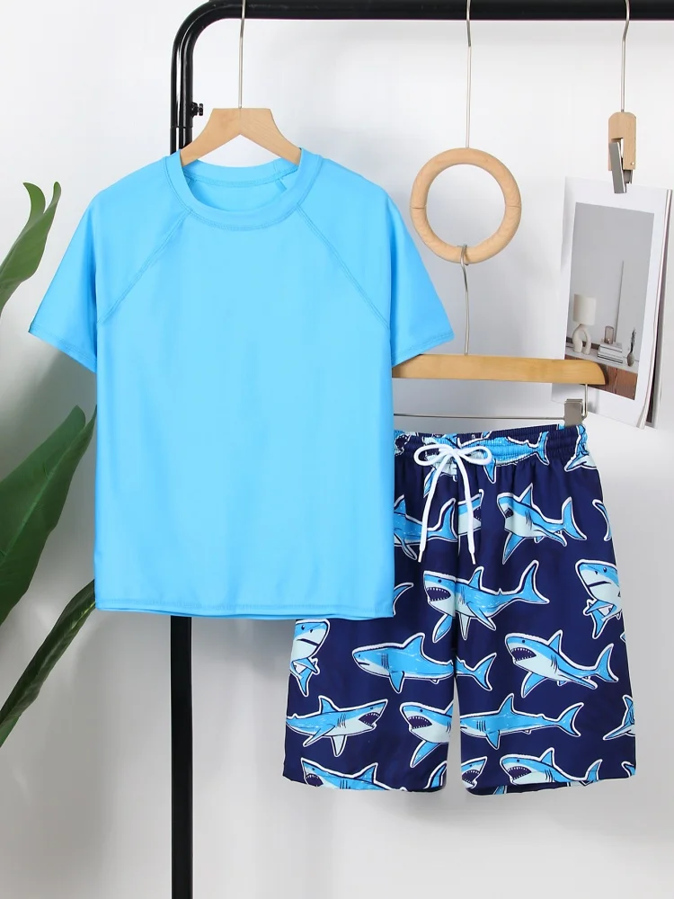 Boy Kids Swimsuit 2025 New Blue Solid Short Sleeve Children Swimwear Summer Two Piece Beachwear Shorts Bathing Suit For Swimming
Boy Kids Swimsuit 2025 New Blue Solid Short Sleeve Children Swimwear Summer Two Piece Beachwear Shorts Bathing Suit For Swimming