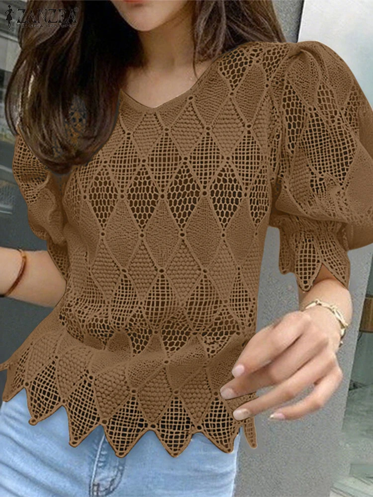 ZANZEA 2025 Fashion Asymmetrical Blouse Women Summer Hollow Out Solid Tunic Tops Elegant Office Shirts Short Puff Sleeve Blusas
ZANZEA 2025 Fashion Asymmetrical Blouse Women Summer Hollow Out Solid Tunic Tops Elegant Office Shirts Short Puff Sleeve Blusas
