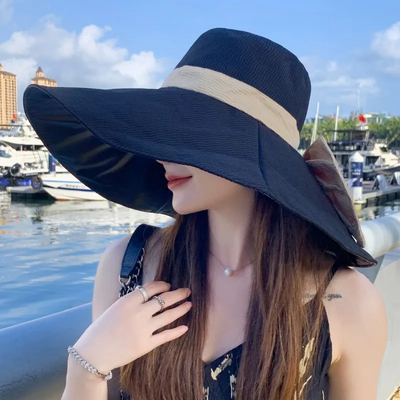 Women's Oversized Bucket Hat – Colorful Coated Sun Hat for Outdoors, UV-Resistant Beach Hat with Wide Brim and Bow Accent
Women's Oversized Bucket Hat – Colorful Coated Sun Hat for Outdoors, UV-Resistant Beach Hat with Wide Brim and Bow Accent