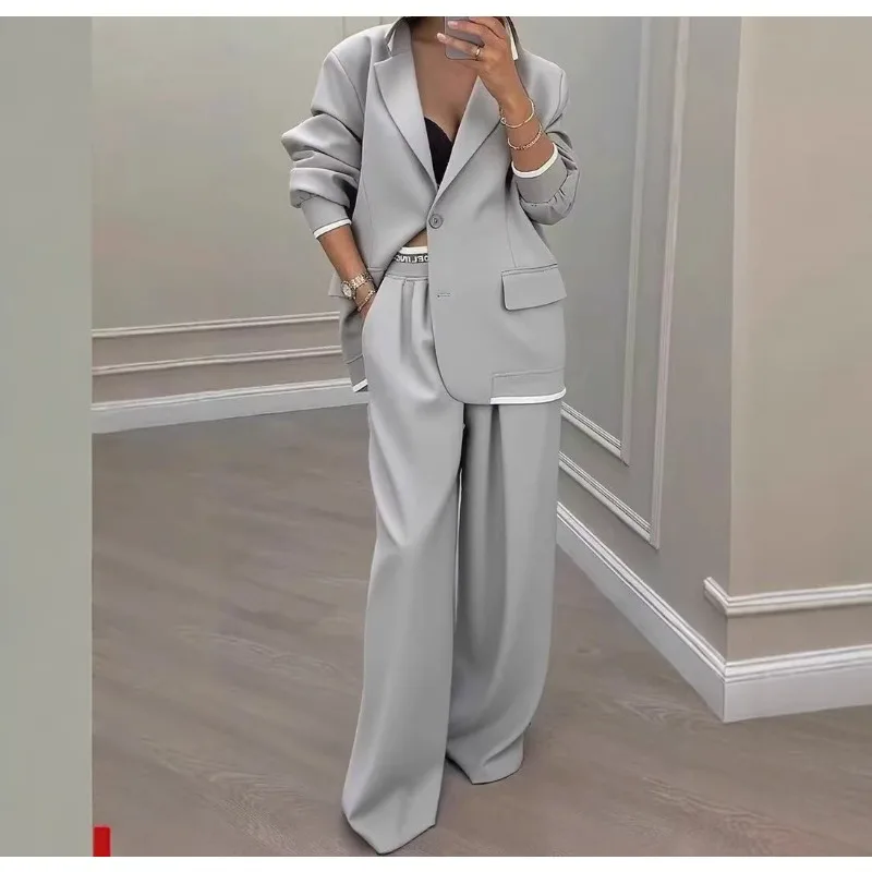 Elegant Women Pants Suit Jacket Two-piece Set Loose Solid New 2026 Autumn Winter Long-sleeved Lapel Top Wide-leg Trousers Suits
Elegant Women Pants Suit Jacket Two-piece Set Loose Solid New 2026 Autumn Winter Long-sleeved Lapel Top Wide-leg Trousers Suits
