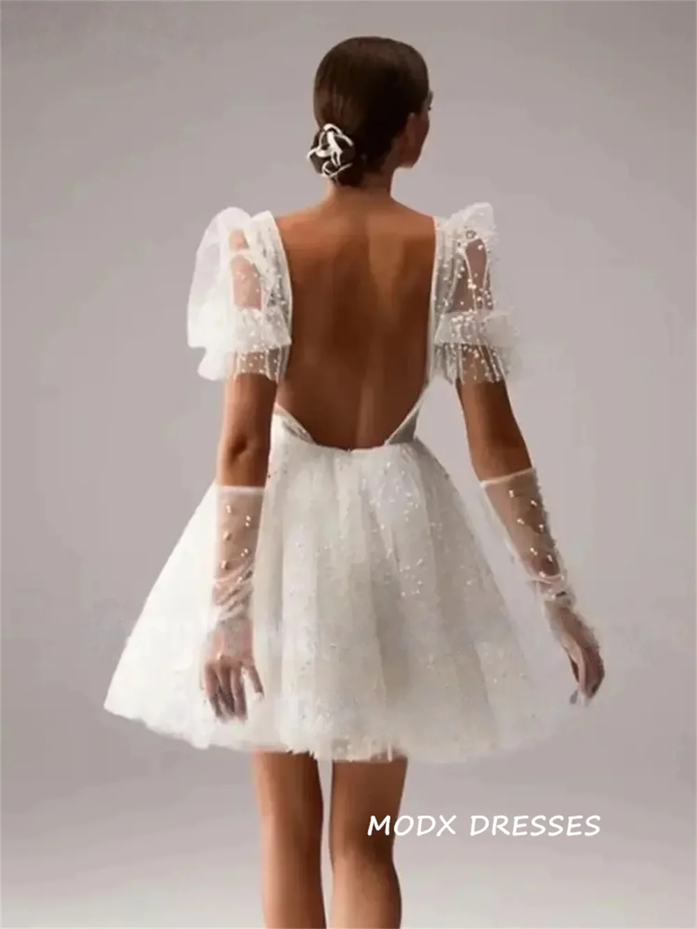 MODX Customized Dot Mini Tulle Wedding Dresses V-Neck A-Line Backless Formal Graduation Gowns Sexy Saudi Arabia Party Dress
MODX Customized Dot Mini Tulle Wedding Dresses V-Neck A-Line Backless Formal Graduation Gowns Sexy Saudi Arabia Party Dress