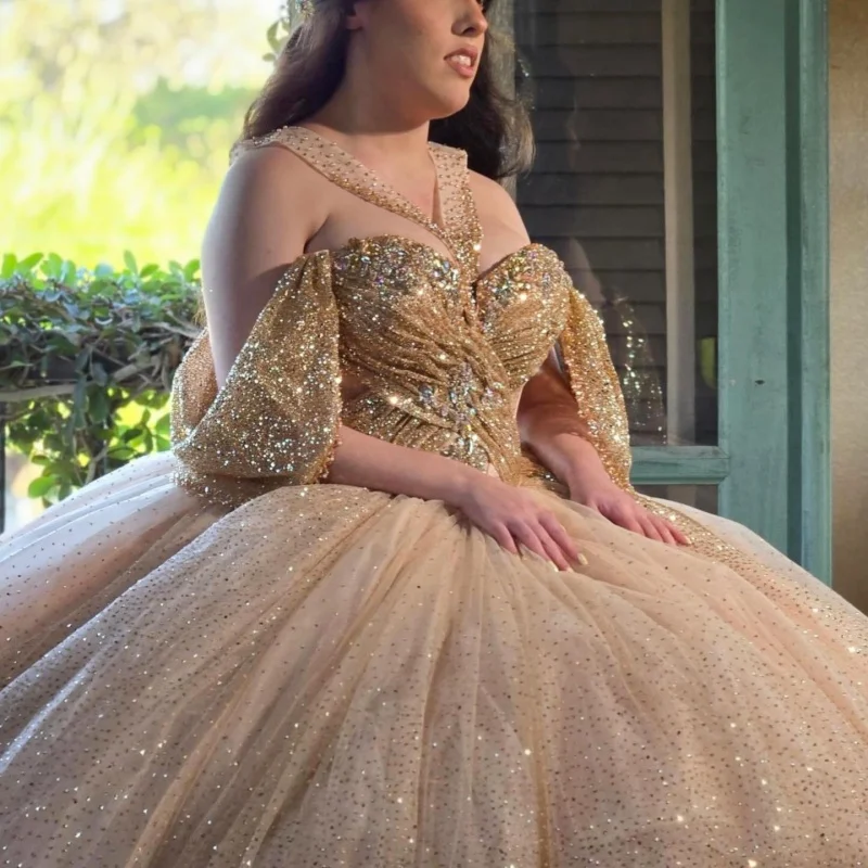 Блестящее платье для церемонии Quinceanera цвета шампанского золота с открытыми плечами, украшенное кристаллами и длинным шлейфом, vestidos de 15 Quinceanera. Индивидуальный заказ
Блестящее платье для церемонии Quinceanera цвета шампанского золота с открытыми плечами, украшенное кристаллами и длинным шлейфом, vestidos de 15 Quinceanera. Индивидуальный заказ