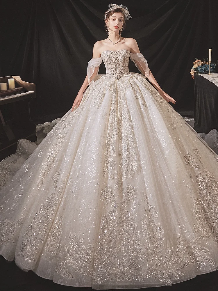 New Ivory Wedding Dresses Off Shoulder Bling Crystal Lace Appliques Beading Court Train Luxury Long Formal Banquet Bridal Gowns
New Ivory Wedding Dresses Off Shoulder Bling Crystal Lace Appliques Beading Court Train Luxury Long Formal Banquet Bridal Gowns