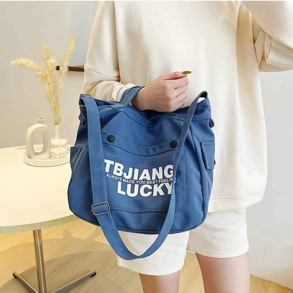 Fashion Large Capacity Canvas Bag Letter Printed Shopping Tote Letter Shoulder Bag Handbag Simple Cloth Crossbody Bag Boys
Fashion Large Capacity Canvas Bag Letter Printed Shopping Tote Letter Shoulder Bag Handbag Simple Cloth Crossbody Bag Boys