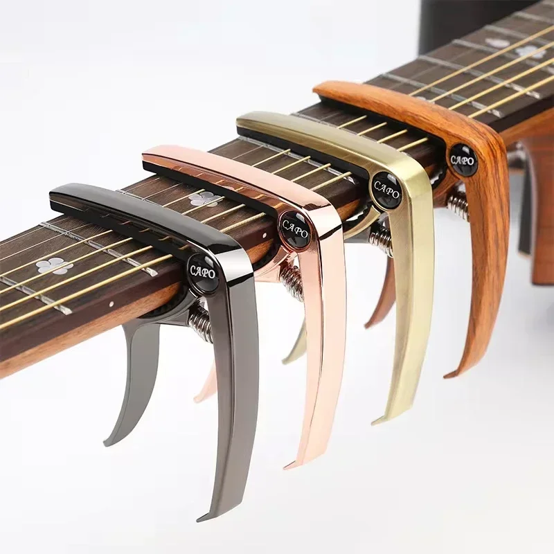 Guitar Capo Metal 1PCS Aluminum Alloy Guitar Tuner Clamp Professional Key Trigger Capo for Acoustic Electric Musical Instruments
Guitar Capo Metal 1PCS Aluminum Alloy Guitar Tuner Clamp Professional Key Trigger Capo for Acoustic Electric Musical Instruments