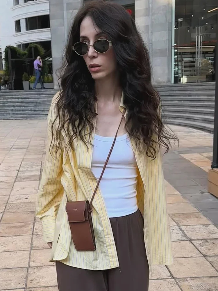 Casual Yellow Striped Loose Shirt Lady Chic Lapel Long-sleeved Single Breasted Cropped Blouse 2026 New Vacation Street Shirts
Casual Yellow Striped Loose Shirt Lady Chic Lapel Long-sleeved Single Breasted Cropped Blouse 2026 New Vacation Street Shirts