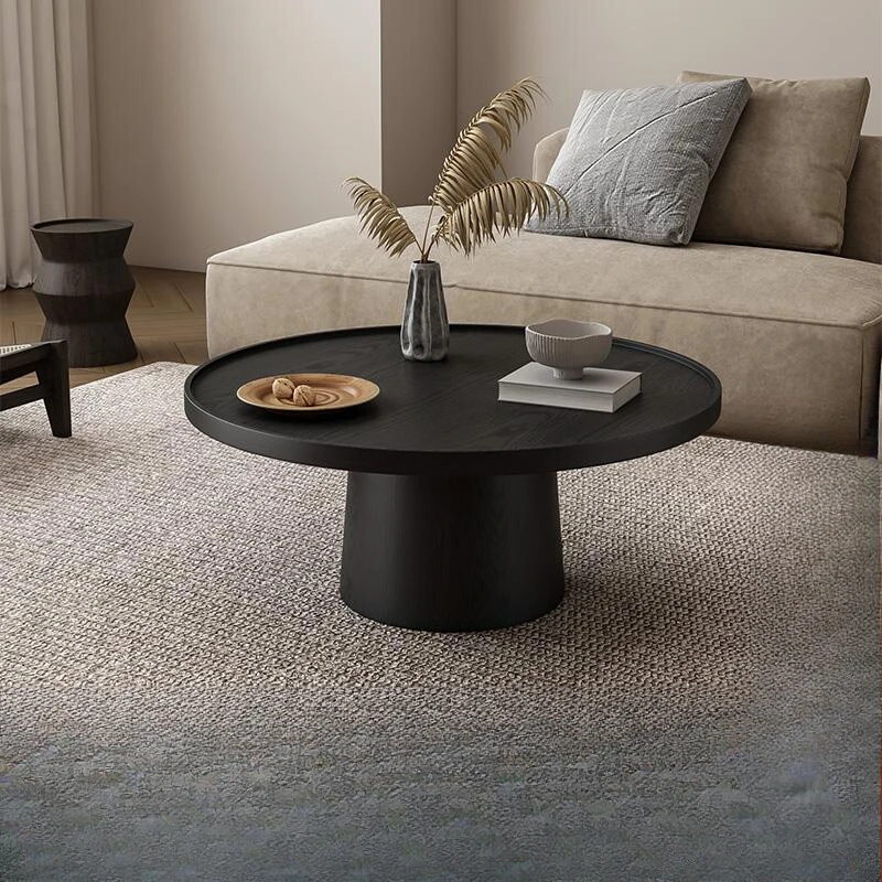 Wabi sand wind living room household round solid wood coffee table negotiation reception designer light luxury carbonized black
Wabi sand wind living room household round solid wood coffee table negotiation reception designer light luxury carbonized black