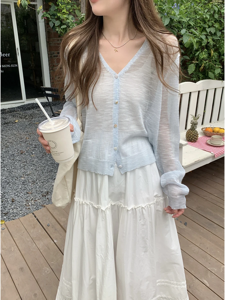 Spring 2026 Women's Thin Long Sleeve V-Neck Knitted Open Cardigan Loose Casual Single Button Sweater Comfortable Korean Style
Spring 2026 Women's Thin Long Sleeve V-Neck Knitted Open Cardigan Loose Casual Single Button Sweater Comfortable Korean Style