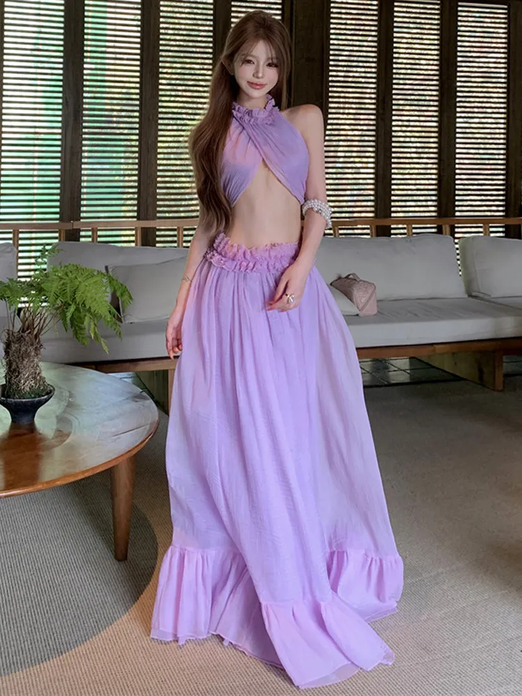 Seaside vacation style hanging neck exposed navel sexy irregular sleeveless vest loose chiffon half body long skirt set
Seaside vacation style hanging neck exposed navel sexy irregular sleeveless vest loose chiffon half body long skirt set