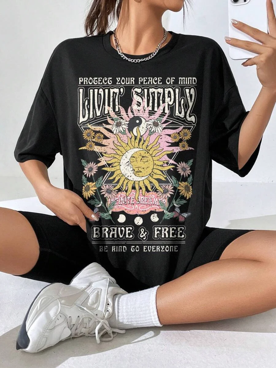 Plus - Size Hippie - Inspired Graphic Tee, Black Short - Sleeve with “LIVIN' SIMPLY” Print
Plus - Size Hippie - Inspired Graphic Tee, Black Short - Sleeve with “LIVIN' SIMPLY” Print