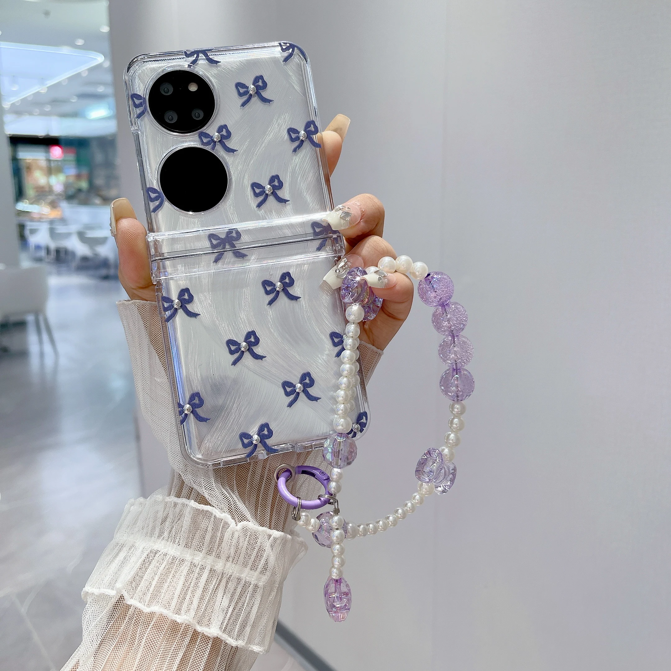 Camlet Paper Purple Bowknot with Bracelet Wristband Chain Hard Acrylic Shockproof Phone Case For Huawei Pocket2 P50 Pocket Cover
Camlet Paper Purple Bowknot with Bracelet Wristband Chain Hard Acrylic Shockproof Phone Case For Huawei Pocket2 P50 Pocket Cover