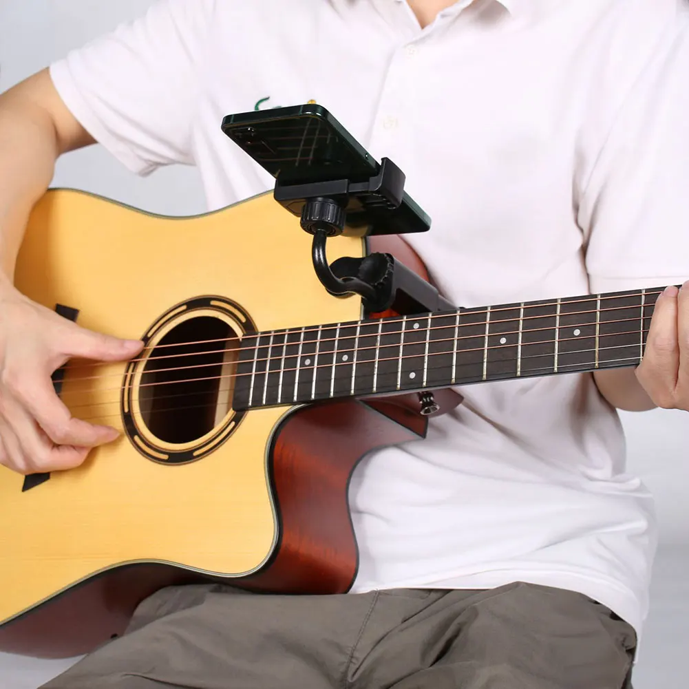 Universal Guitar Headstock Phone Clip For Online Lessons 360° Rotation For Perfect Viewing Angles Ideal For Music Lovers
Universal Guitar Headstock Phone Clip For Online Lessons 360° Rotation For Perfect Viewing Angles Ideal For Music Lovers