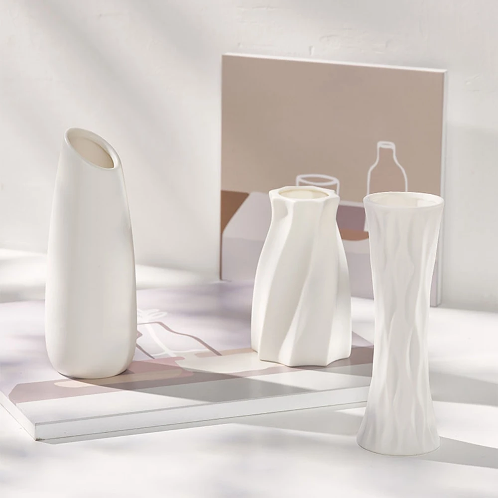 1Nordic white ceramic vase simple desktop living room home decoration water raised flower arrangement creative decoration vase
1Nordic white ceramic vase simple desktop living room home decoration water raised flower arrangement creative decoration vase