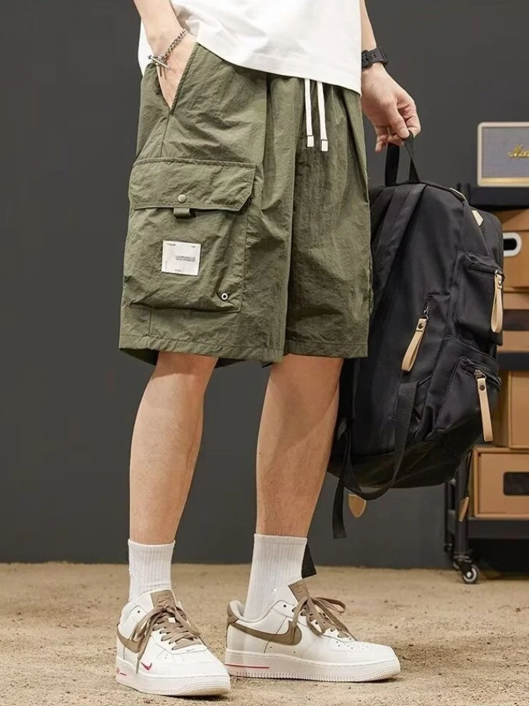 Knee-Length Men's Shorts for Summer Workwear Beach Design with Large Pockets Thin and Loose Quick-Dry Material for Active Sports
Knee-Length Men's Shorts for Summer Workwear Beach Design with Large Pockets Thin and Loose Quick-Dry Material for Active Sports