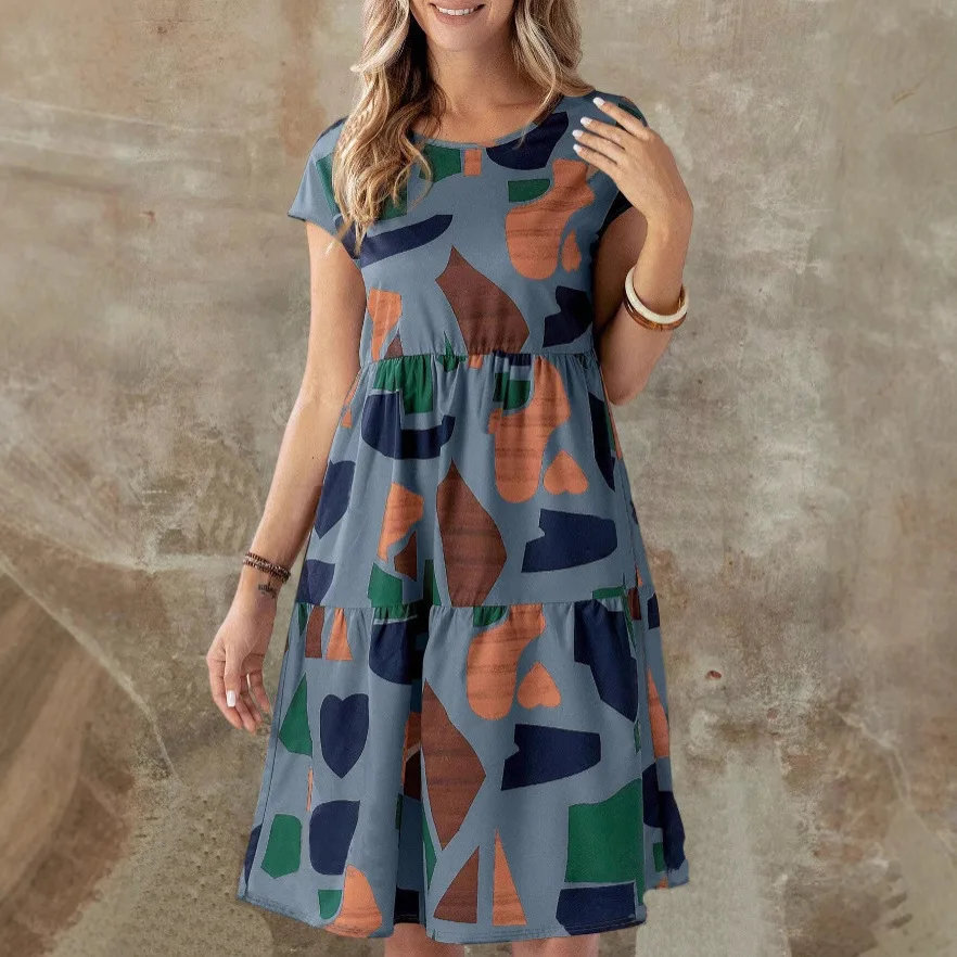 The New Spring/Summer 2025 Collection of Elegant and Simple Color-blocked Women's Dress with Pattern Printed Round Neck
The New Spring/Summer 2025 Collection of Elegant and Simple Color-blocked Women's Dress with Pattern Printed Round Neck