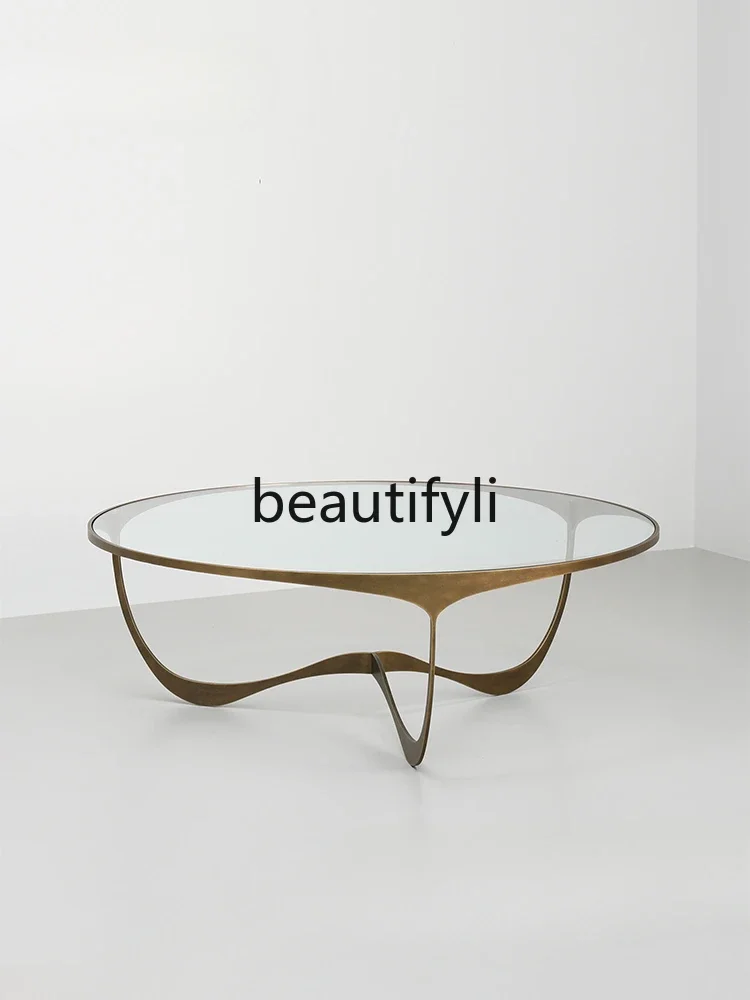 Simple fiberglass coffee table serpentine round table villa light luxury metal coffee table
Simple fiberglass coffee table serpentine round table villa light luxury metal coffee table