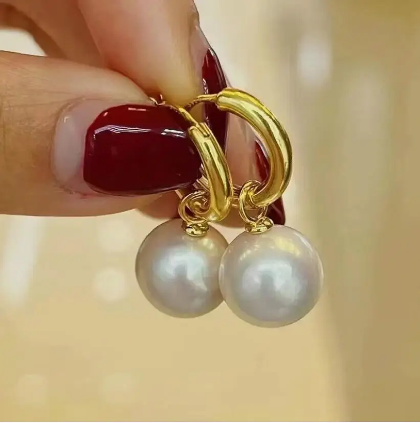 classic pair of 10-11mm 9-10mm south sea round white pearl dangle earring 925s
classic pair of 10-11mm 9-10mm south sea round white pearl dangle earring 925s