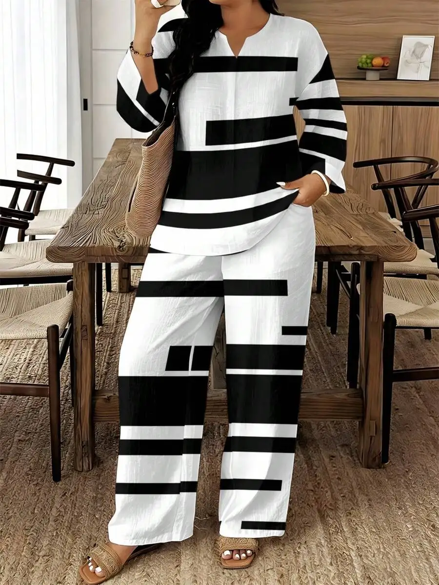 Black And White Stripe V-Neck Plus Size Two-Piece Set Loose Fit Wide Leg Pants
Black And White Stripe V-Neck Plus Size Two-Piece Set Loose Fit Wide Leg Pants
