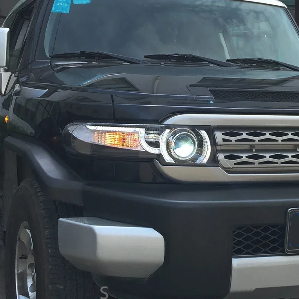 Авто передние фонари для Toyota FJ Cruiser 2007-2017, светодиодные автомобильные фары в сборе, обновление Land Rover, дизайн, аксессуары для бифокальных линз
Авто передние фонари для Toyota FJ Cruiser 2007-2017, светодиодные автомобильные фары в сборе, обновление Land Rover, дизайн, аксессуары для бифокальных линз