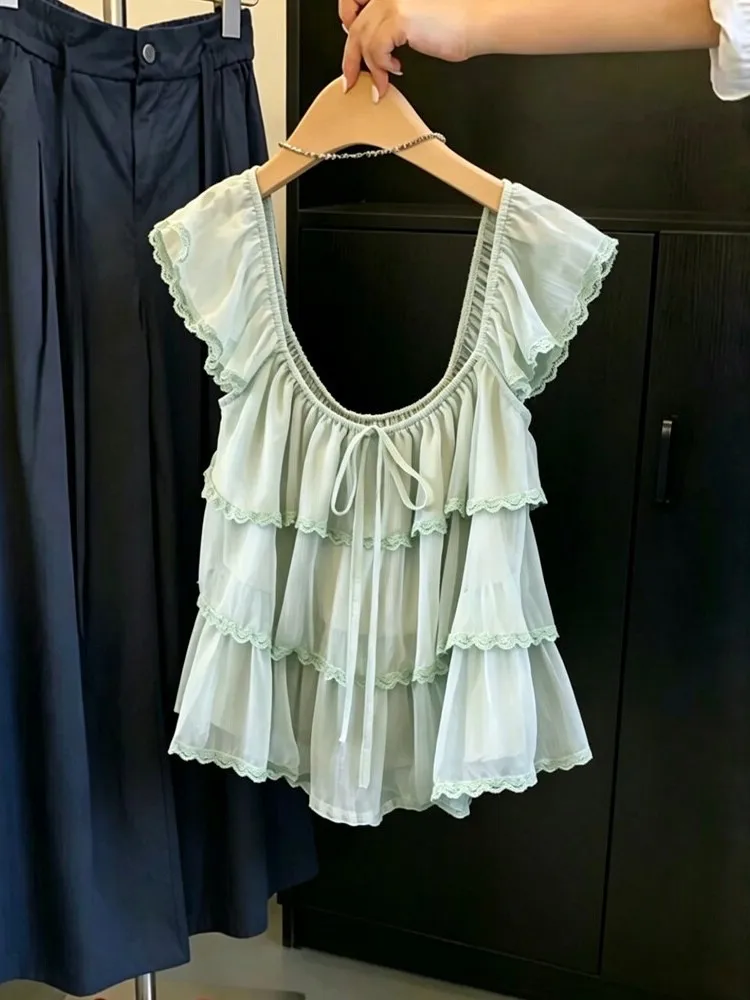 Sweet Lace Splice Shirt Women's Summer 2026 New Style Fly Sleeve Tie Waist Top Korean Version Loose Fit Flounce Hem Short Sleeve
Sweet Lace Splice Shirt Women's Summer 2026 New Style Fly Sleeve Tie Waist Top Korean Version Loose Fit Flounce Hem Short Sleeve