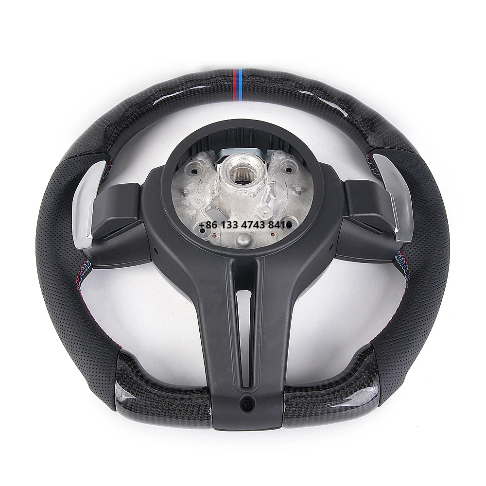 Carbon fiber steering wheel, available in a variety of styles
Carbon fiber steering wheel, available in a variety of styles