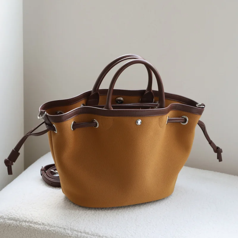 Large Capacity Commuter Canvas the Tote Bag with genuine Leather bags for women Handle Fashion Commuter Basket Canvas Handheld
Large Capacity Commuter Canvas the Tote Bag with genuine Leather bags for women Handle Fashion Commuter Basket Canvas Handheld