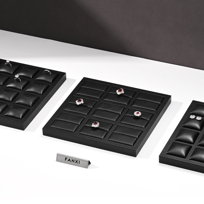 Black leather light luxury jewelry display rack, high-end leather rings, necklaces, earrings counter, jewelry display tray
Black leather light luxury jewelry display rack, high-end leather rings, necklaces, earrings counter, jewelry display tray
