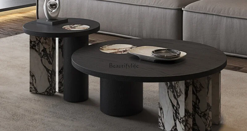 Italian minimalist rock slab round coffee table black solid wood round coffee table
Italian minimalist rock slab round coffee table black solid wood round coffee table