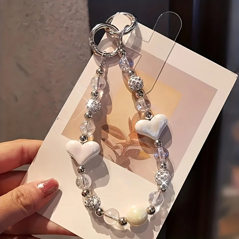 Light Luxury Crystal Shiny Mobile Phone Chain Colorful Heart-shaped Beads Hanging Rope Handmade Phone Pendant Anti Loss Keychain
Light Luxury Crystal Shiny Mobile Phone Chain Colorful Heart-shaped Beads Hanging Rope Handmade Phone Pendant Anti Loss Keychain