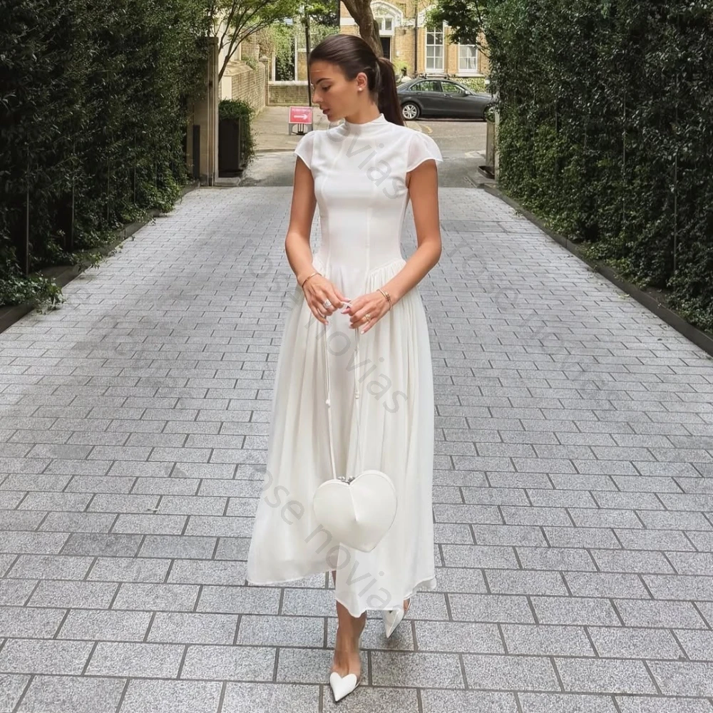 White Formal Casual Midi Dress with High Neck, Cap Sleeves, Corset Waist and Flowy Chiffon Skirt for Bridal Events City Walks
White Formal Casual Midi Dress with High Neck, Cap Sleeves, Corset Waist and Flowy Chiffon Skirt for Bridal Events City Walks