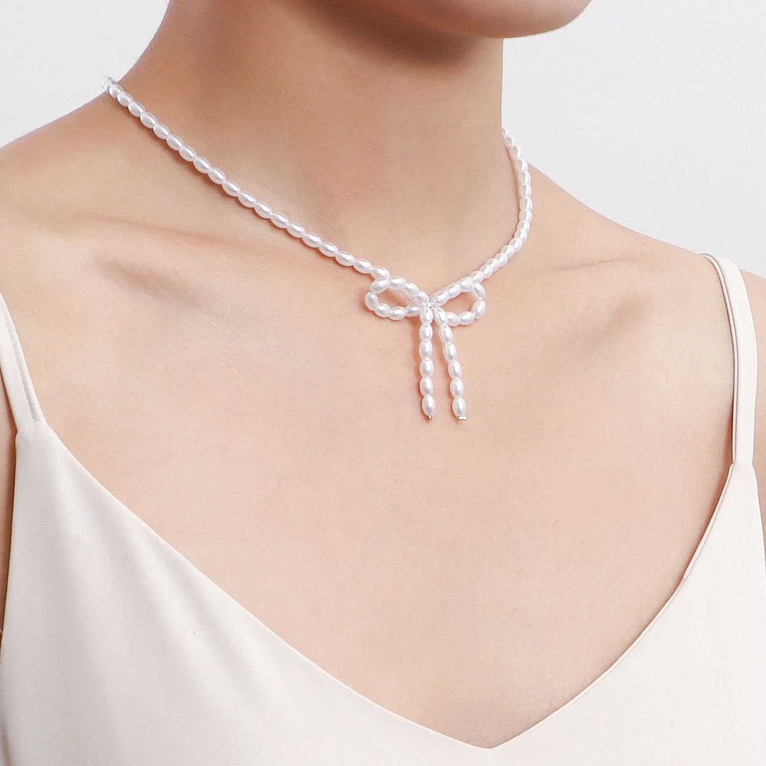 Jewelry choker bow pearl necklace women's design sense light luxury beaded necklace
Jewelry choker bow pearl necklace women's design sense light luxury beaded necklace