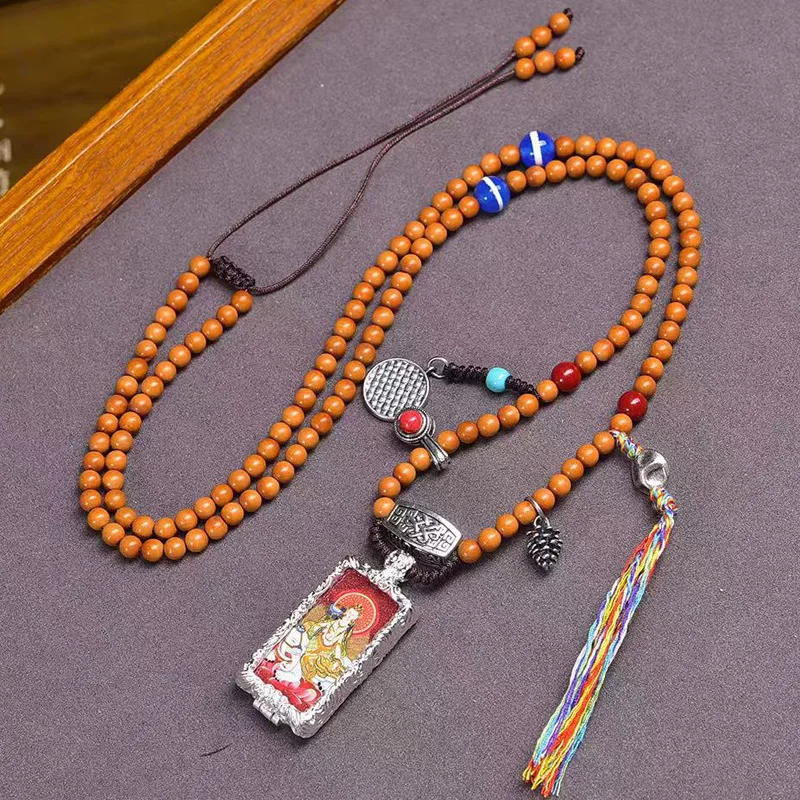 Olive Stone Buddha Bead Necklace Double-Sided Small Thangka Yellow Wealth God Samantabhadra Pendant Sweater Chain
Olive Stone Buddha Bead Necklace Double-Sided Small Thangka Yellow Wealth God Samantabhadra Pendant Sweater Chain