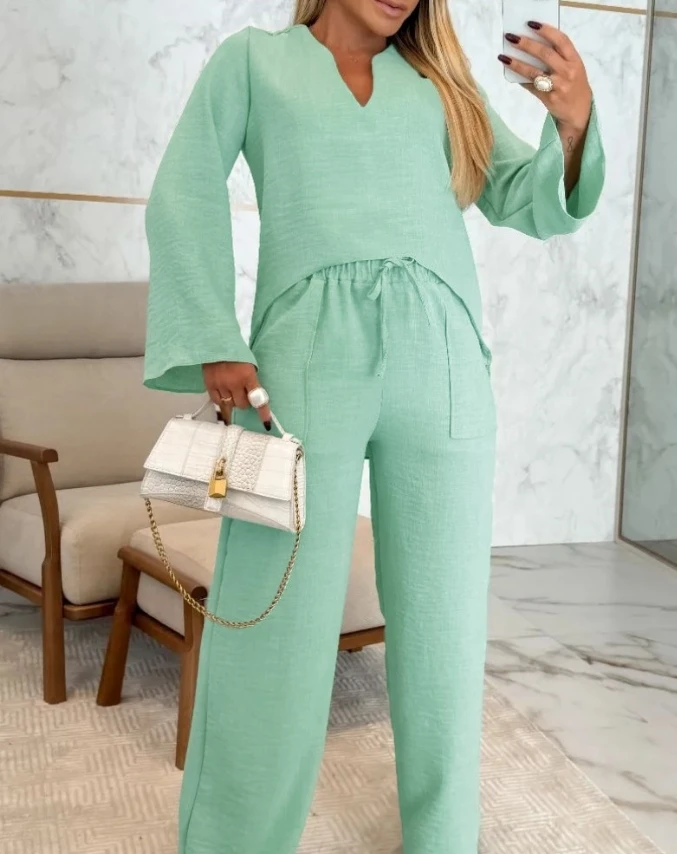 Two piece stand up collar long sleeved asymmetrical hem top elastic tie waist straight leg pants casual suit sports suit women's
Two piece stand up collar long sleeved asymmetrical hem top elastic tie waist straight leg pants casual suit sports suit women's
