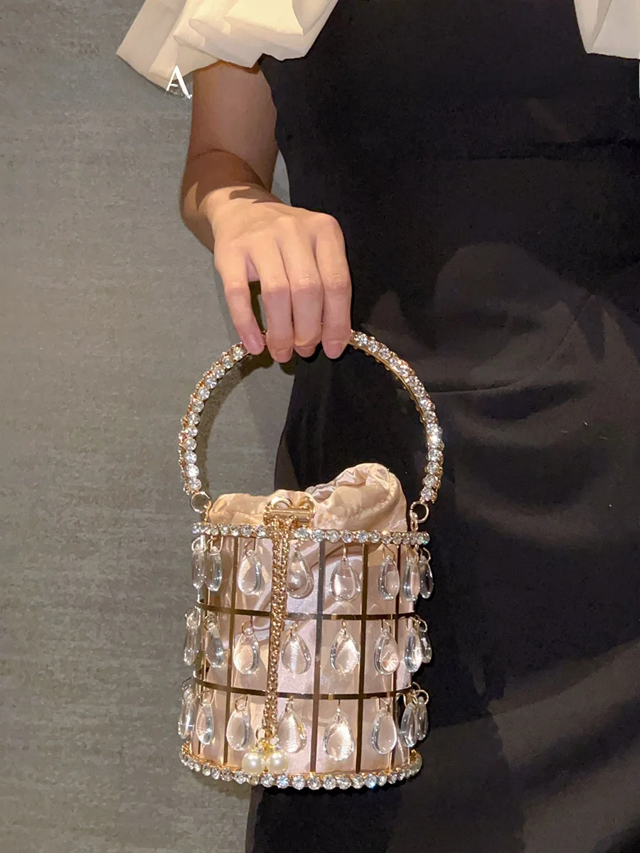 UGALS Metal Hollow out Crystal Bucket Handbag Shiny Diamond round Water Bucket Crossbody Bag for Women Sweet Lady Style Summe...
UGALS Metal Hollow out Crystal Bucket Handbag Shiny Diamond round Water Bucket Crossbody Bag for Women Sweet Lady Style Summe...
