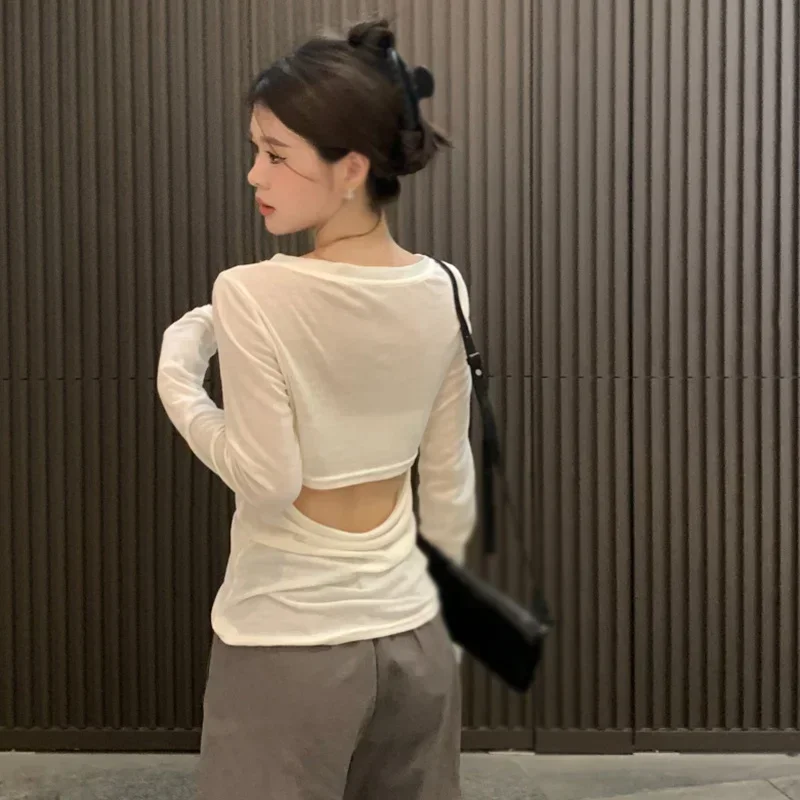 Women's top Solid color V-neck Revealing waist Women's long sleeves
Women's top Solid color V-neck Revealing waist Women's long sleeves