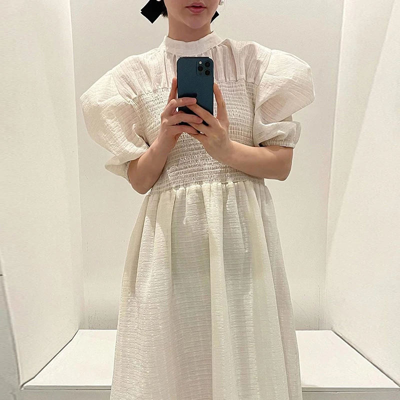 South KoreachicFrench Retro Style Elegant Stand Collar Pleated Waist Slimming Design Puff Sleeve Long Dress for Women
South KoreachicFrench Retro Style Elegant Stand Collar Pleated Waist Slimming Design Puff Sleeve Long Dress for Women