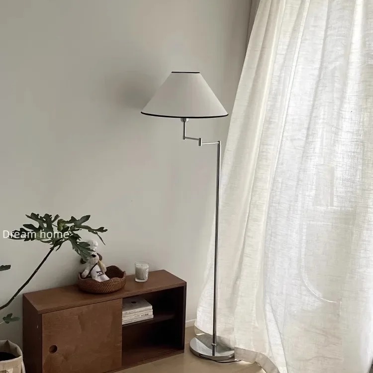 Bedroom cream floor lamp Nordic living room Korean style ambient light Creative modern floor lamp
Bedroom cream floor lamp Nordic living room Korean style ambient light Creative modern floor lamp