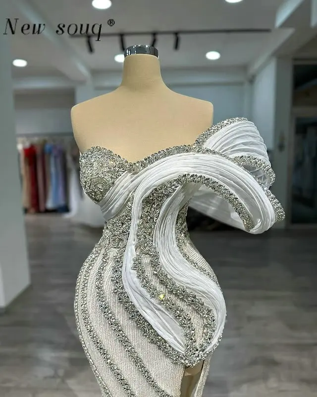 Off White Long One Shoulder Mermaid Evening Dresses with Silver Crystals Customized Saudi Arabia Luxury Wedding Party Gowns
Off White Long One Shoulder Mermaid Evening Dresses with Silver Crystals Customized Saudi Arabia Luxury Wedding Party Gowns