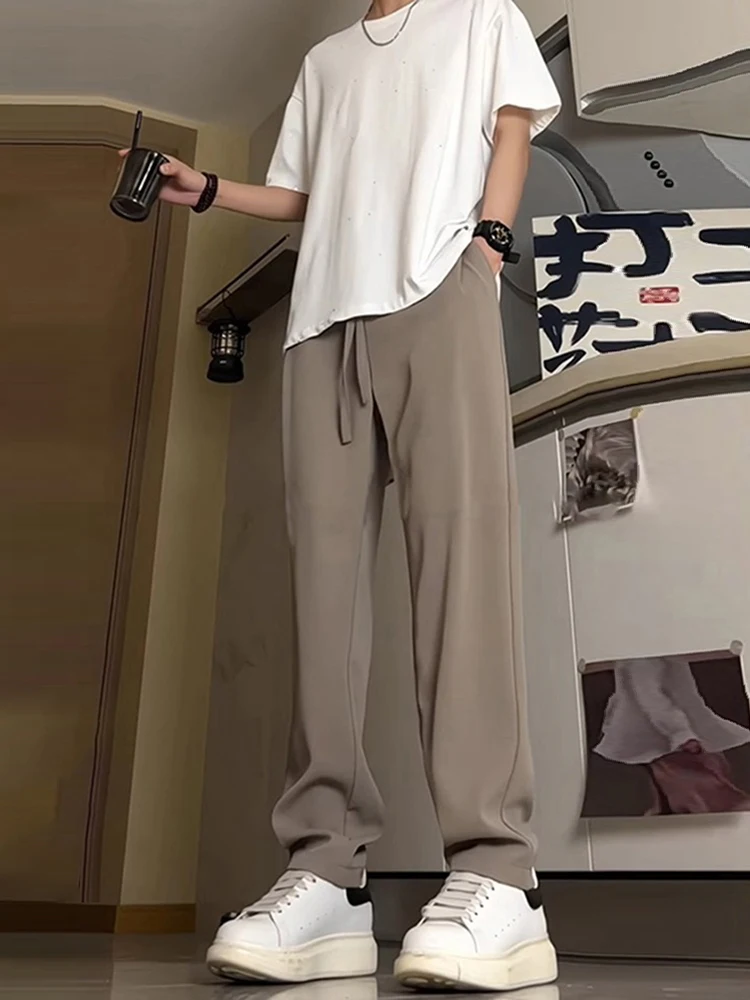 Мужские повседневные брюки из ледяного шелка цвета хаки, с высокой талией, в американском стиле, летние, свободного кроя, дышащие, прямые джинсы
Мужские повседневные брюки из ледяного шелка цвета хаки, с высокой талией, в американском стиле, летние, свободного кроя, дышащие, прямые джинсы