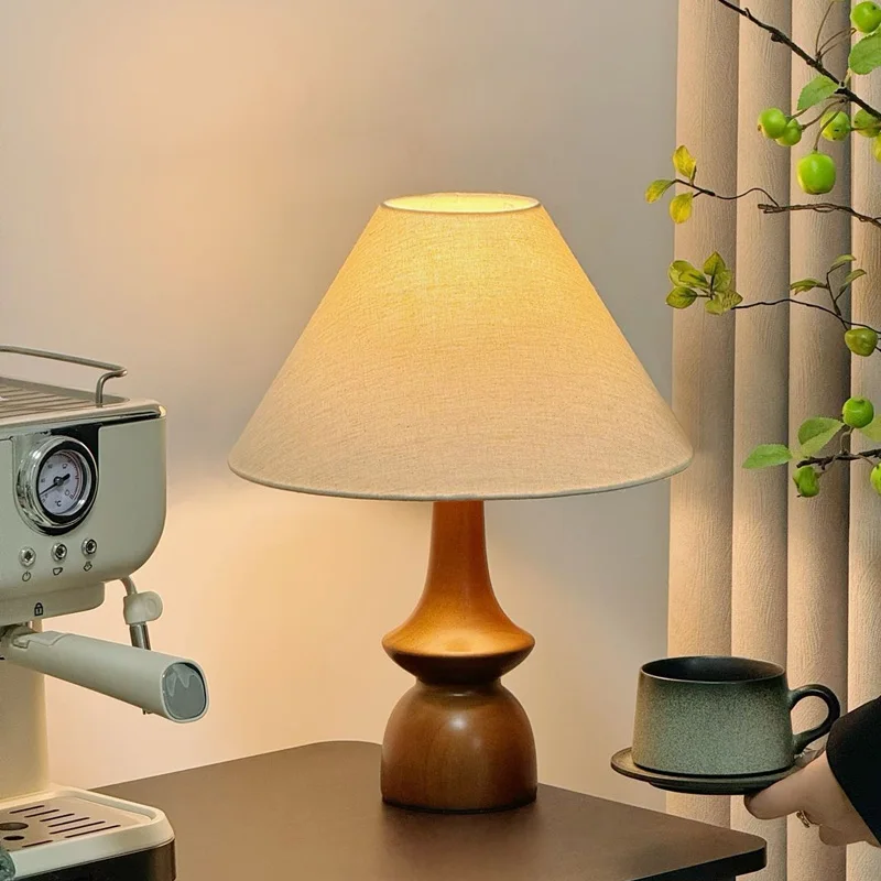 Medieval simple wabi-sabi wind table lamp American retro bedroom bedside lamp solid wood advanced sense new Chinese atmosphere
Medieval simple wabi-sabi wind table lamp American retro bedroom bedside lamp solid wood advanced sense new Chinese atmosphere