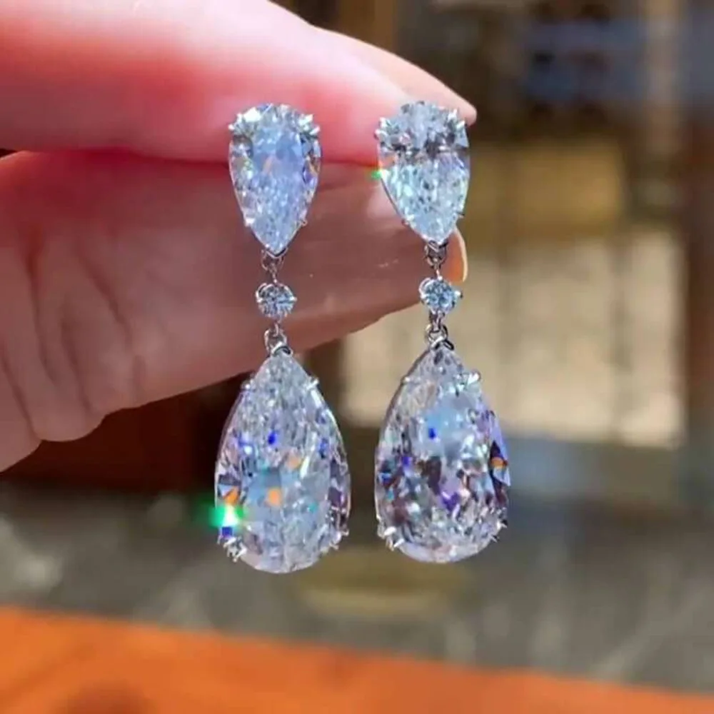S925 pure silver water drop zircon earrings, luxurious and exquisite geometric pear-shaped long earrings for women
S925 pure silver water drop zircon earrings, luxurious and exquisite geometric pear-shaped long earrings for women