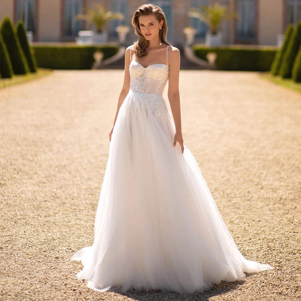Romantic Spaghetti Straps Tulle Wedding Dress for Bride Customized Zipper Back Lace Appliques A-Line Sweep Train Bridal Gowns
Romantic Spaghetti Straps Tulle Wedding Dress for Bride Customized Zipper Back Lace Appliques A-Line Sweep Train Bridal Gowns