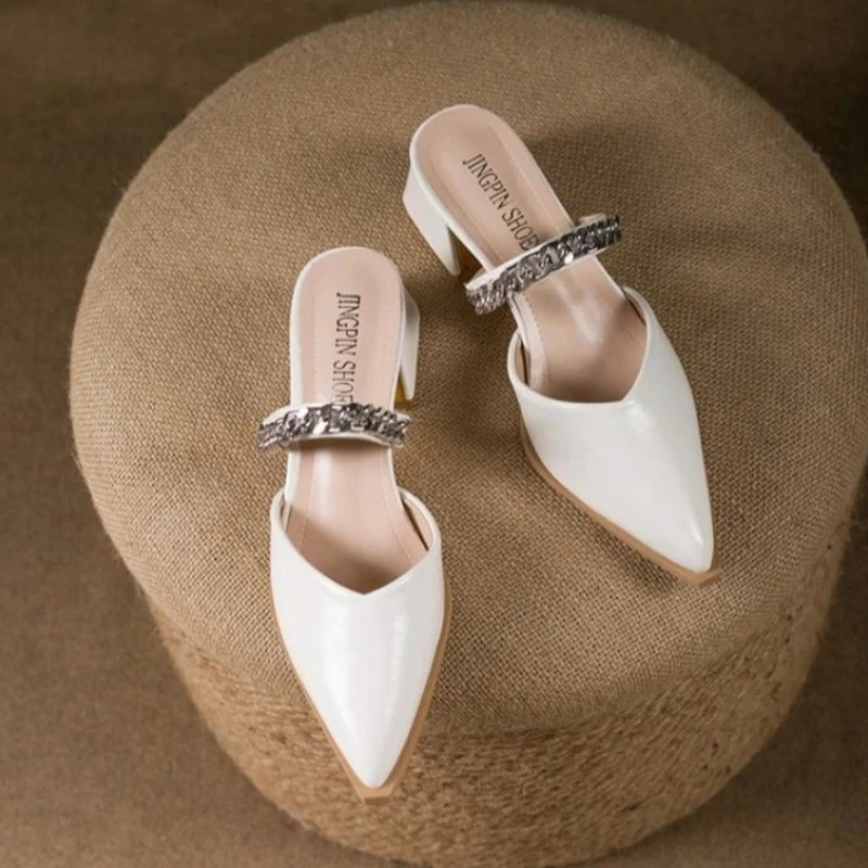 Summer New Baotou Slippers Pointed Toe Shallow Mouth Metal Chain One Slip Strap Anti-slip Outer Wear Square Heel High Heels
Summer New Baotou Slippers Pointed Toe Shallow Mouth Metal Chain One Slip Strap Anti-slip Outer Wear Square Heel High Heels