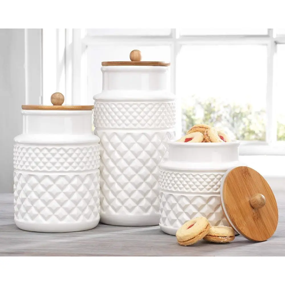 Set of 3 White Canisters for Vinegar, 3 Round Jars with Bamboo Lids and Rubber Gaskets for Kitchen Food Storage.
Set of 3 White Canisters for Vinegar, 3 Round Jars with Bamboo Lids and Rubber Gaskets for Kitchen Food Storage.