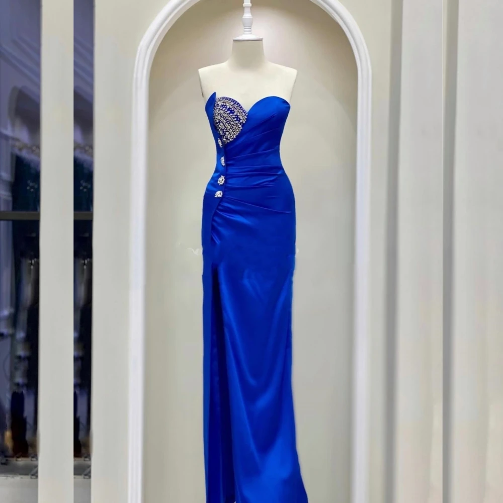 Customized Evening Satin Pleat Rhinestone Graduation Sheath Strapless Bespoke Occasion Gown Long Dresses Saudi Arabia
Customized Evening Satin Pleat Rhinestone Graduation Sheath Strapless Bespoke Occasion Gown Long Dresses Saudi Arabia