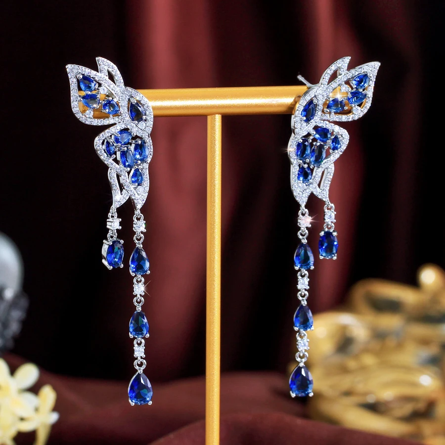 ThreeGraces красивые серьги в форме бабочки синего и белого цвета с кубическим цирконием, длинные серьги-капли с кисточками для женщин, повседневные вечерние украшения E2002
ThreeGraces красивые серьги в форме бабочки синего и белого цвета с кубическим цирконием, длинные серьги-капли с кисточками для женщин, повседневные вечерние украшения E2002