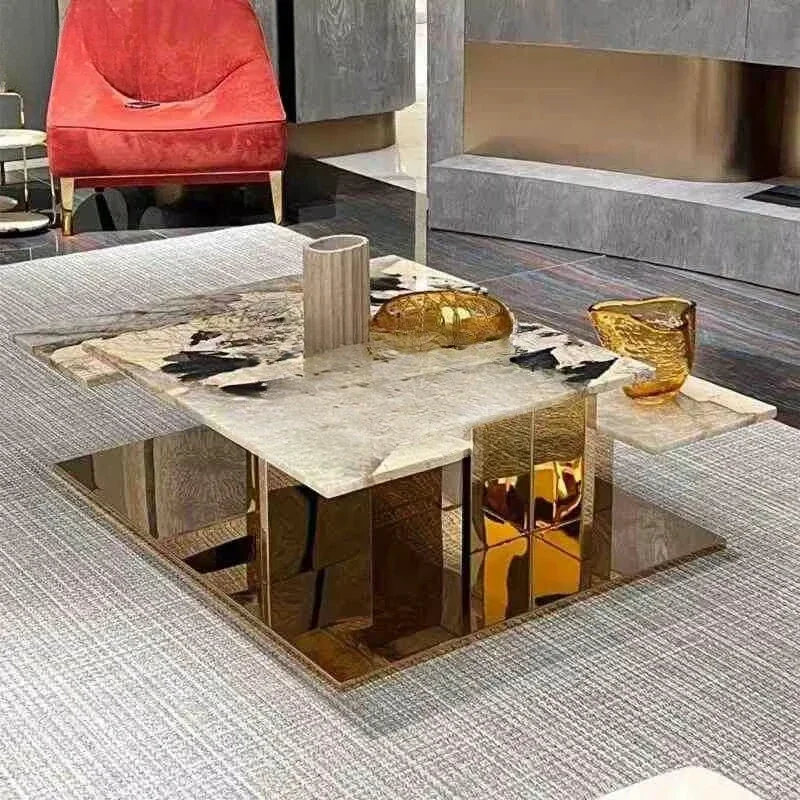 A Modern irregular marble center table with unique steel and stone design suitable for family living room dining room or gym use
A Modern irregular marble center table with unique steel and stone design suitable for family living room dining room or gym use