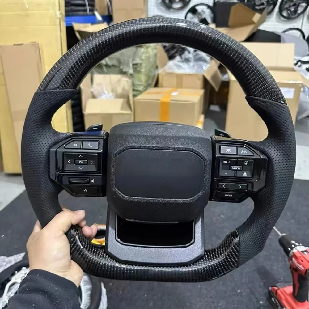 Steering Wheel New Sports Car Steering Whee For Toyota Hilux Land Cruiser Yaris LC300 LHigh-quality Carbon Fiber Car Accessories
Steering Wheel New Sports Car Steering Whee For Toyota Hilux Land Cruiser Yaris LC300 LHigh-quality Carbon Fiber Car Accessories